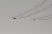 연기를 내뿜으로 에어쇼를 선보이는 항공기들의 모습1사진(00222)