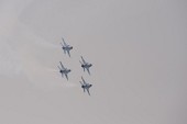 연기를 내뿜으로 에어쇼를 선보이는 항공기들의 모습19사진(00309)